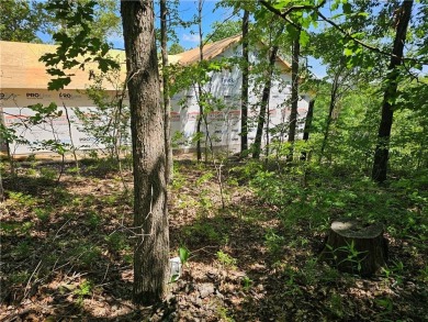 This excellent lot has minimal sloping in the back, most of the on Bella Vista Country Club and Golf Course in Arkansas - for sale on GolfHomes.com, golf home, golf lot