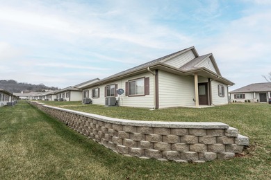 Experience relaxed, worry-free living in this exceptional patio on Payne Stewart Golf Club of Branson Hills - Front in Missouri - for sale on GolfHomes.com, golf home, golf lot