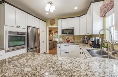 Stunning move-in ready condo in Maples of Novi! Enjoy the ease on The Maples Club in Michigan - for sale on GolfHomes.com, golf home, golf lot