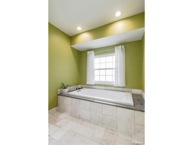 Stunning move-in ready condo in Maples of Novi! Enjoy the ease on The Maples Club in Michigan - for sale on GolfHomes.com, golf home, golf lot