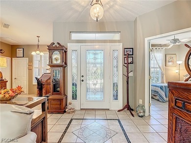 This OVERSIZED Ibis II POOL HOME with a private PRESERVE VIEW in on Herons Glen Golf and Country Club in Florida - for sale on GolfHomes.com, golf home, golf lot