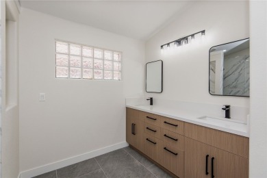 Prepare to be wowed by the freshly remodeled residence awaiting on Desert Lakes Golf Course in Arizona - for sale on GolfHomes.com, golf home, golf lot