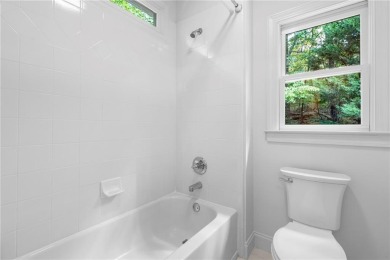 Welcome to Aerie Court, a beautifully remodeled four-sided brick on Cherokee Town and Country Club in Georgia - for sale on GolfHomes.com, golf home, golf lot