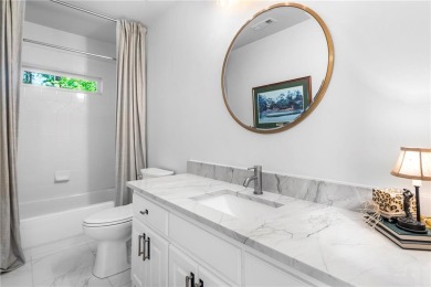 Welcome to Aerie Court, a beautifully remodeled four-sided brick on Cherokee Town and Country Club in Georgia - for sale on GolfHomes.com, golf home, golf lot