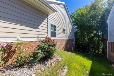 Stunning move-in ready condo in Maples of Novi! Enjoy the ease on The Maples Club in Michigan - for sale on GolfHomes.com, golf home, golf lot