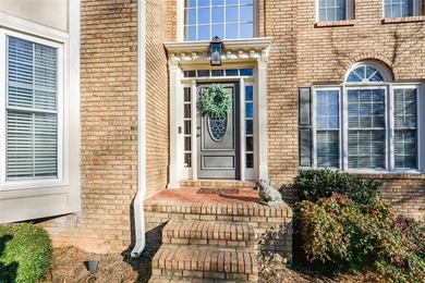 Imagine pulling into the driveway of a stunning traditional on Canongate At Eagle Watch Golf Club in Georgia - for sale on GolfHomes.com, golf home, golf lot