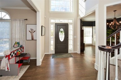 Imagine pulling into the driveway of a stunning traditional on Canongate At Eagle Watch Golf Club in Georgia - for sale on GolfHomes.com, golf home, golf lot