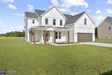 Welcome to The Bakersfield - a brand-new construction home in on Bear Trail Golf Club in North Carolina - for sale on GolfHomes.com, golf home, golf lot