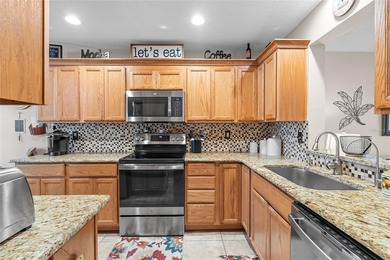 Hard-to-find 1st Floor Unit in the prized Indigo Pond Community on Lansbrook Golf Club in Florida - for sale on GolfHomes.com, golf home, golf lot