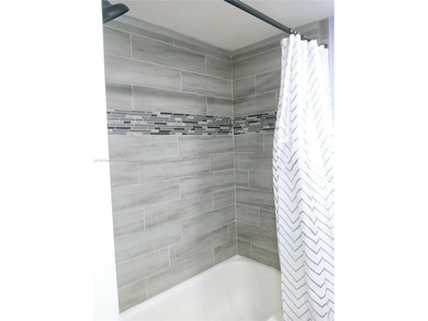 Priced to Sell! Enjoy tranquil lake views from this beautifully on Sunrise Lakes Phase IV Golf Course in Florida - for sale on GolfHomes.com, golf home, golf lot