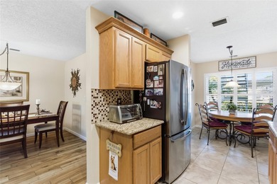 Hard-to-find 1st Floor Unit in the prized Indigo Pond Community on Lansbrook Golf Club in Florida - for sale on GolfHomes.com, golf home, golf lot