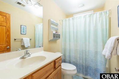 Coastal elegance meets timeless craftsmanship in Kitty Hawk, NC! on Seascape Golf Links in North Carolina - for sale on GolfHomes.com, golf home, golf lot