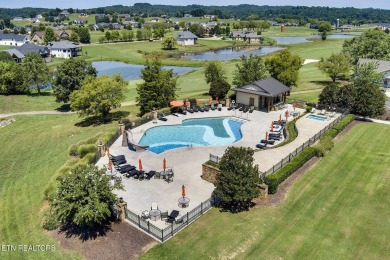 Discover the essence of serene living in this exceptional on Tennessee National Golf Club in Tennessee - for sale on GolfHomes.com, golf home, golf lot