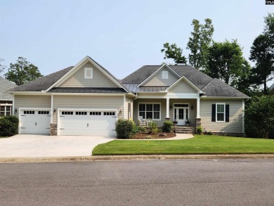 Welcome Home to 125 Bay Pointe Drive. Enjoy serene lake living on Timberlake Country Club in South Carolina - for sale on GolfHomes.com, golf home, golf lot