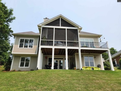 Welcome Home to 125 Bay Pointe Drive. Enjoy serene lake living on Timberlake Country Club in South Carolina - for sale on GolfHomes.com, golf home, golf lot