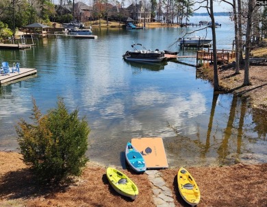 Welcome Home to 125 Bay Pointe Drive. Enjoy serene lake living on Timberlake Country Club in South Carolina - for sale on GolfHomes.com, golf home, golf lot