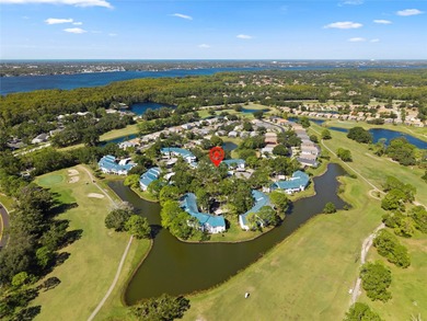 Hard-to-find 1st Floor Unit in the prized Indigo Pond Community on Lansbrook Golf Club in Florida - for sale on GolfHomes.com, golf home, golf lot