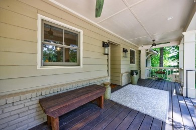 Stunning home with a rocking chair front porch on a friendly on Bobby Jones Golf Club in Georgia - for sale on GolfHomes.com, golf home, golf lot
