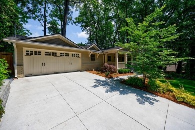Stunning home with a rocking chair front porch on a friendly on Bobby Jones Golf Club in Georgia - for sale on GolfHomes.com, golf home, golf lot