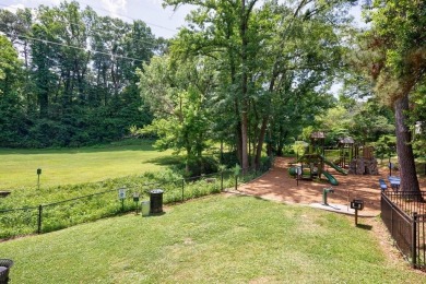 Stunning home with a rocking chair front porch on a friendly on Bobby Jones Golf Club in Georgia - for sale on GolfHomes.com, golf home, golf lot