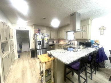 Welcome Home! A charming home tucked away in a beautiful on The Course at River Oaks in Arkansas - for sale on GolfHomes.com, golf home, golf lot