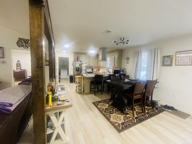 Welcome Home! A charming home tucked away in a beautiful on The Course at River Oaks in Arkansas - for sale on GolfHomes.com, golf home, golf lot