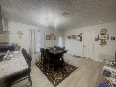 Welcome Home! A charming home tucked away in a beautiful on The Course at River Oaks in Arkansas - for sale on GolfHomes.com, golf home, golf lot