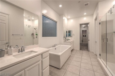 Experience unparalleled luxury and serenity in this contemporary on Reflection Bay Golf Club in Nevada - for sale on GolfHomes.com, golf home, golf lot