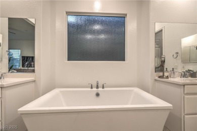 Experience unparalleled luxury and serenity in this contemporary on Reflection Bay Golf Club in Nevada - for sale on GolfHomes.com, golf home, golf lot