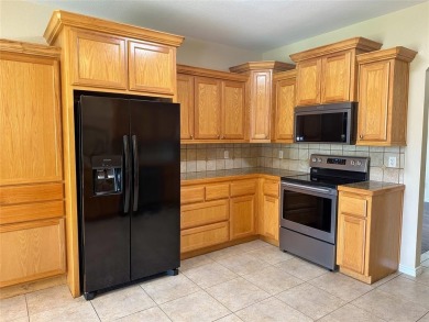 Beautiful custom 4BD 2BA home located just a golf cart ride away on Gatesville Country Club in Texas - for sale on GolfHomes.com, golf home, golf lot