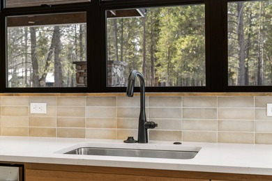 Experience timeless design and modern mountain living in this on Sunriver Caldera Springs Golf Course in Oregon - for sale on GolfHomes.com, golf home, golf lot