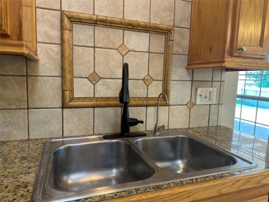 Beautiful custom 4BD 2BA home located just a golf cart ride away on Gatesville Country Club in Texas - for sale on GolfHomes.com, golf home, golf lot