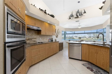 Live the Dream: Gorgeous Lakefront Property in Rotonda West! on Pinemoor West Golf Club in Florida - for sale on GolfHomes.com, golf home, golf lot