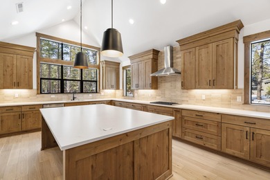 Experience timeless design and modern mountain living in this on Sunriver Caldera Springs Golf Course in Oregon - for sale on GolfHomes.com, golf home, golf lot