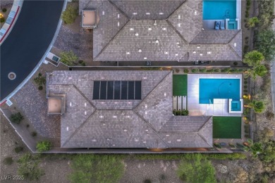 Experience unparalleled luxury and serenity in this contemporary on Reflection Bay Golf Club in Nevada - for sale on GolfHomes.com, golf home, golf lot