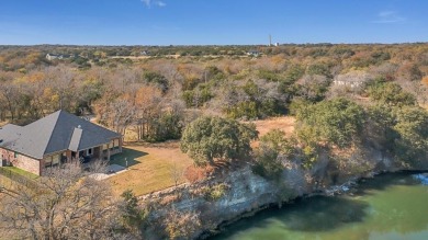 Home still smells new with beautiful views overlooking the on White Bluff Resort - New Course in Texas - for sale on GolfHomes.com, golf home, golf lot