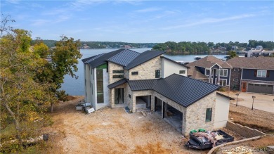 The nicest home in the most upscale subdivision at the LOZ! This on The Oaks Golf Course in Missouri - for sale on GolfHomes.com, golf home, golf lot