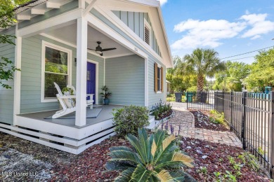 MUST SEE this charming Old Town Bay St Louis cottage with pool! on The Bridges Golf Club At Hollywood Casino in Mississippi - for sale on GolfHomes.com, golf home, golf lot