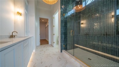 The nicest home in the most upscale subdivision at the LOZ! This on The Oaks Golf Course in Missouri - for sale on GolfHomes.com, golf home, golf lot