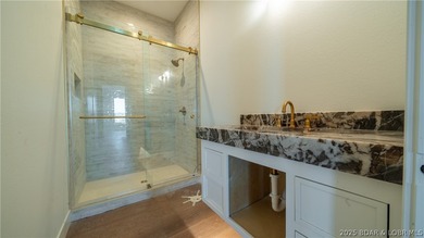 The nicest home in the most upscale subdivision at the LOZ! This on The Oaks Golf Course in Missouri - for sale on GolfHomes.com, golf home, golf lot