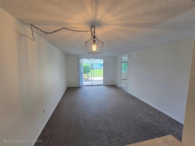 One or more photo(s) has been virtually staged. Carefree Living on Seven Springs Golf and Country Club in Florida - for sale on GolfHomes.com, golf home, golf lot