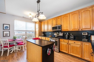 Elegant end unit townhome ideally situated just one block from on Crystal Springs Resort in New Jersey - for sale on GolfHomes.com, golf home, golf lot