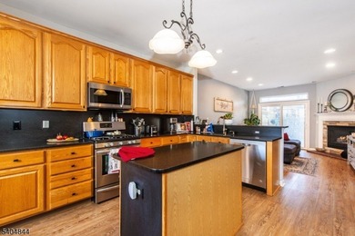 Elegant end unit townhome ideally situated just one block from on Crystal Springs Resort in New Jersey - for sale on GolfHomes.com, golf home, golf lot