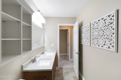 Tucked away in the coveted LPGA community, 116 Joyelle Circle is on LPGA International Golf Course in Florida - for sale on GolfHomes.com, golf home, golf lot