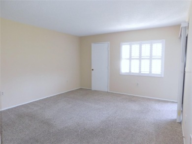 Just what you have been waiting for....! FIRST floor, pet on East Lake Woodlands Country Club in Florida - for sale on GolfHomes.com, golf home, golf lot
