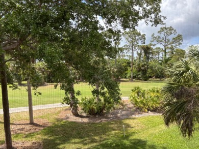 Lovely unfurnished second-floor unit at Flamingo Fairways in on Lely Resort Golf and Country Club in Florida - for sale on GolfHomes.com, golf home, golf lot