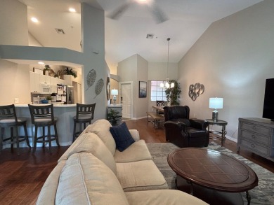 Lovely unfurnished second-floor unit at Flamingo Fairways in on Lely Resort Golf and Country Club in Florida - for sale on GolfHomes.com, golf home, golf lot