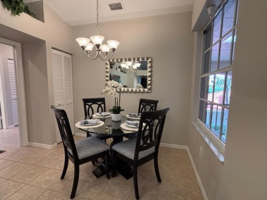 Lovely unfurnished second-floor unit at Flamingo Fairways in on Lely Resort Golf and Country Club in Florida - for sale on GolfHomes.com, golf home, golf lot
