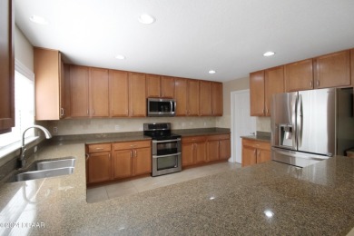 Tucked away in the coveted LPGA community, 116 Joyelle Circle is on LPGA International Golf Course in Florida - for sale on GolfHomes.com, golf home, golf lot
