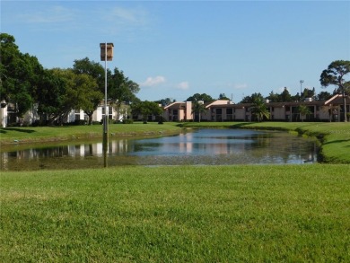 Just what you have been waiting for....! FIRST floor, pet on East Lake Woodlands Country Club in Florida - for sale on GolfHomes.com, golf home, golf lot